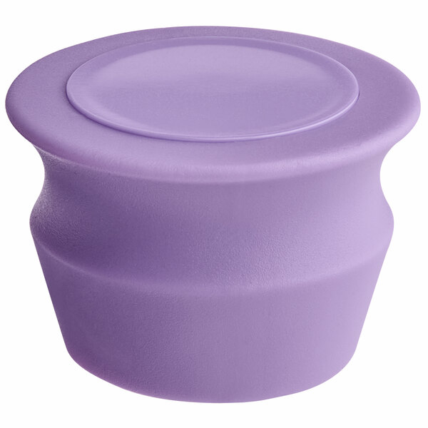 A purple Franmara wine stopper container with a lid.