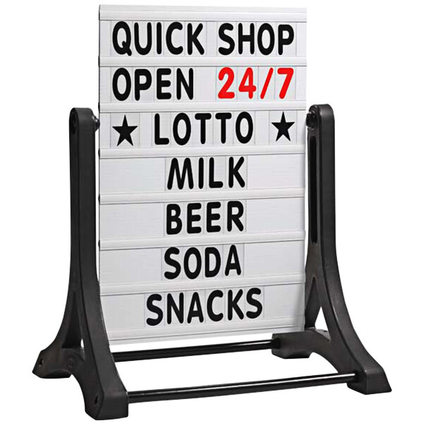 A white Aarco letterboard panel with black text reading "Quick Shop Open 24/7"