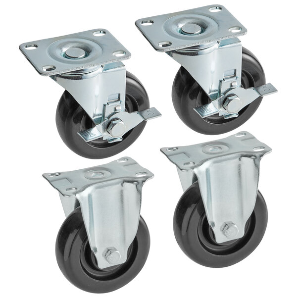 A set of four Cooking Performance Group casters with black rubber wheels.