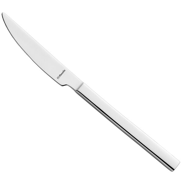 An Amefa Cube stainless steel table knife with a silver handle.