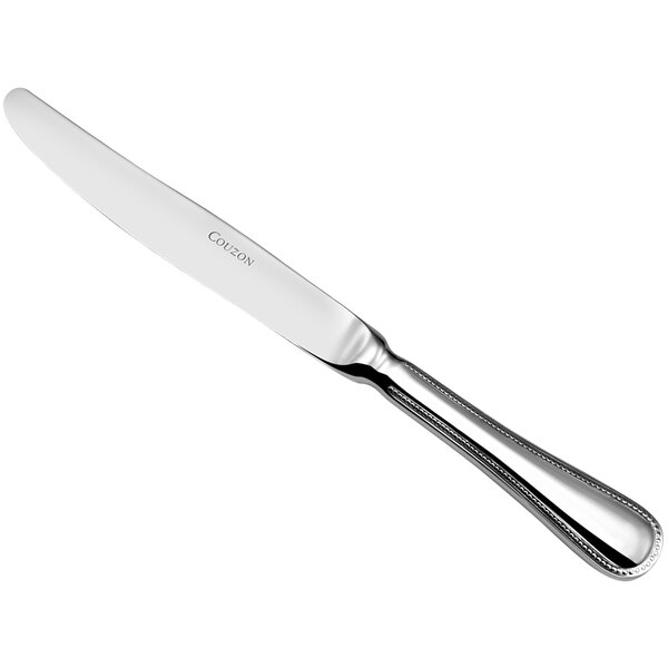 A Couzon by Amefa Le Perle stainless steel table knife with a handle.