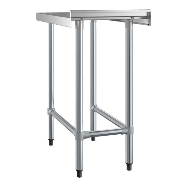 A stainless steel table with four legs, a rectangular top, and a raised backsplash along the back edge.