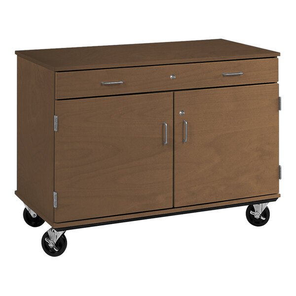 A brown I.D. Systems mobile storage cabinet with two doors and wheels.