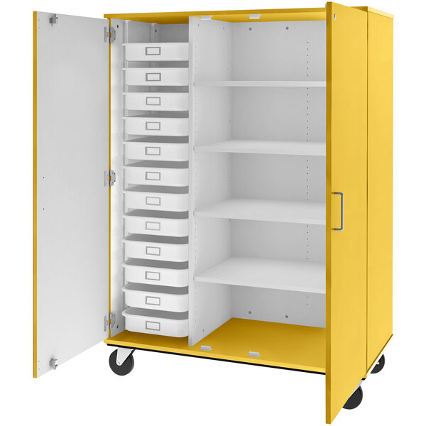 A sun yellow I.D. Systems mobile storage cabinet with shelves and trays.