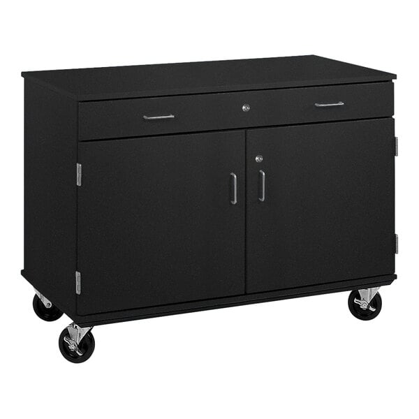 An I.D. Systems black cabinet on wheels with two doors and a drawer.