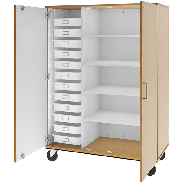 A maple I.D. Systems mobile storage cabinet with trays and shelves.