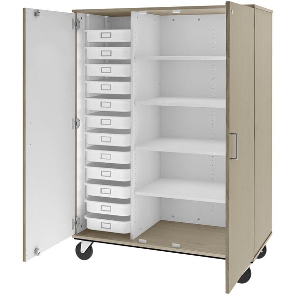 A white storage cabinet with shelves and drawers.