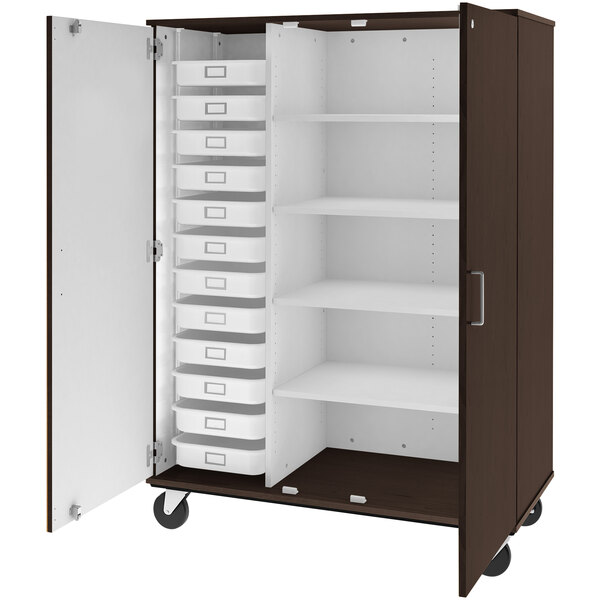 A brown storage cabinet with white shelves and trays.