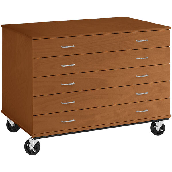 A medium cherry wooden mobile storage cabinet with five drawers on wheels.