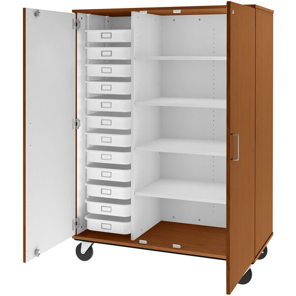 A brown and white I.D. Systems mobile storage cabinet with drawers and shelves.