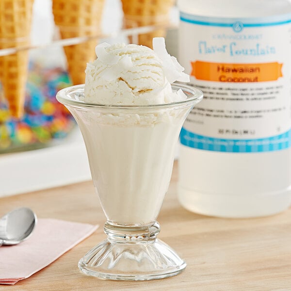 A glass of ice cream with a scoop of LorAnn Hawaiian Coconut syrup.