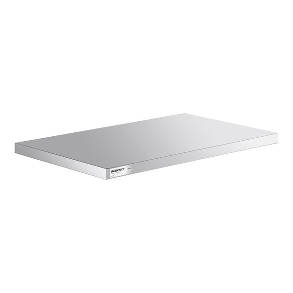 A rectangular, flat, metallic shelf with a smooth surface and a small label on the front edge.