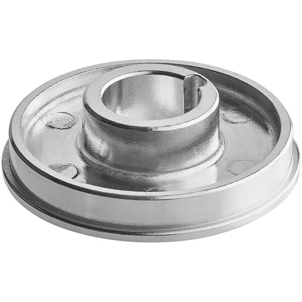 A silver metal flange with a hole in the center.