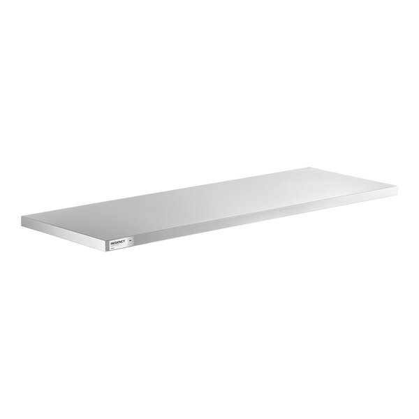 A rectangular, flat, metallic shelf with a smooth surface and a small label on the front edge.