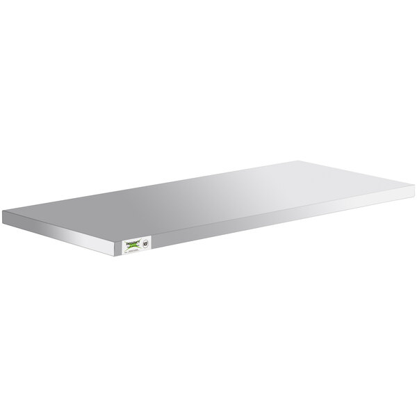 A white rectangular stainless steel shelf with a green label.