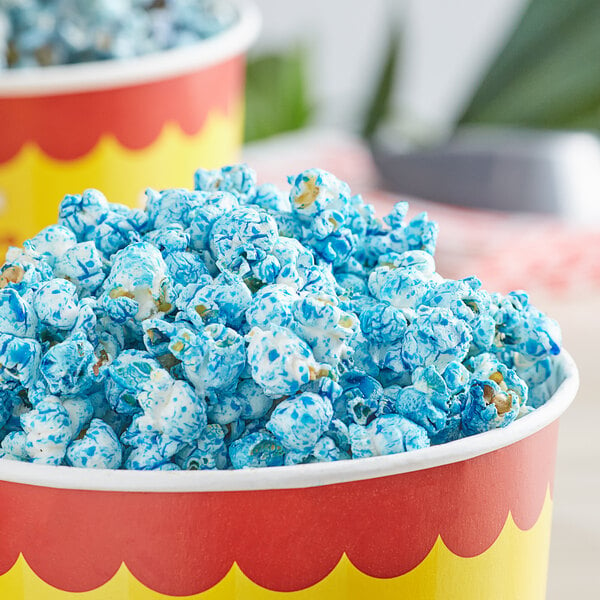 A bowl of blue and white popcorn with Great Western Blue Raspberry Popcorn Glaze.