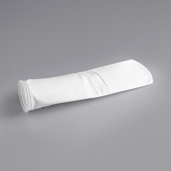 A white rolled up 3M Filtration Products polypropylene filter bag.