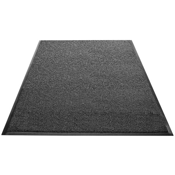 A black rectangular Guardian Promo+ entrance mat with a black border.