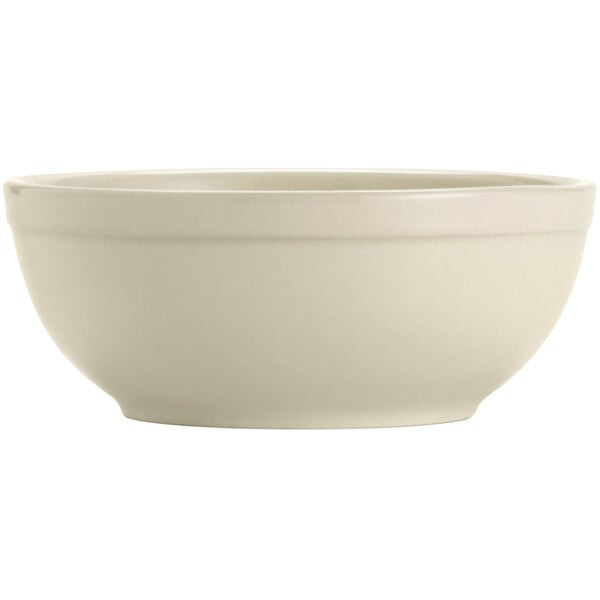 A Libbey Porcelana Cream white porcelain nappie bowl with a rolled edge on a white background.