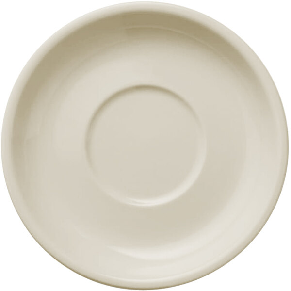 A Libbey Porcelana cream white porcelain saucer with a circular center and a small rim.