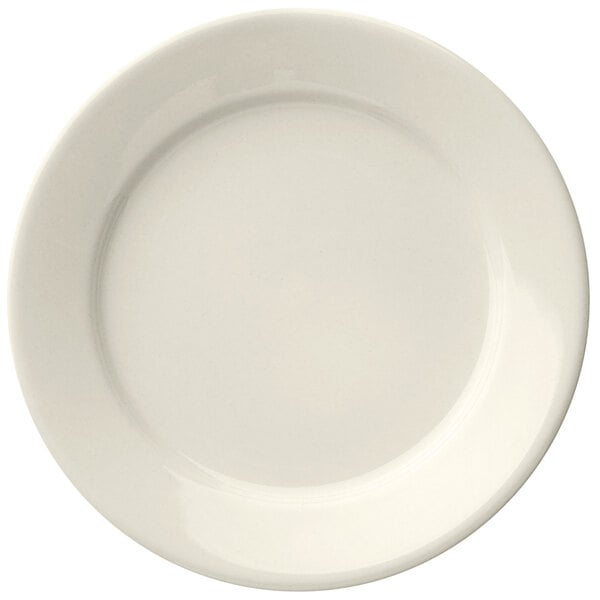 A close-up of a Libbey Porcelana white porcelain plate with a plain white rim.