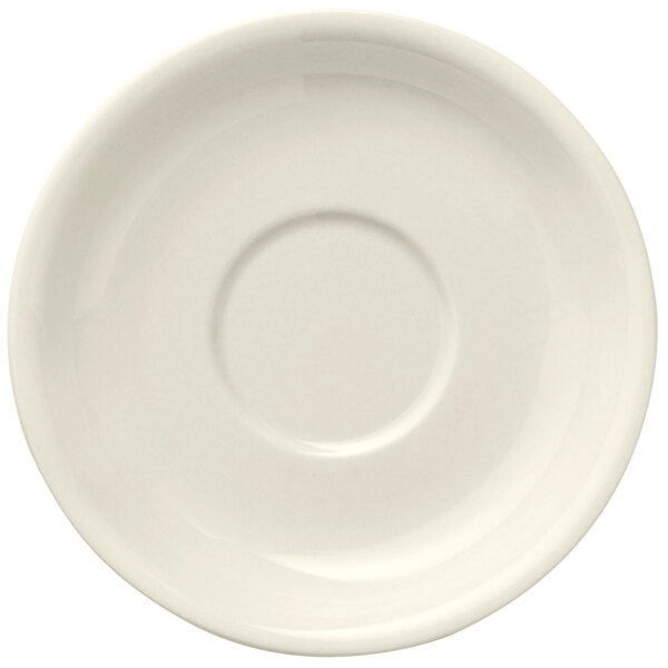 A Libbey Porcelana white porcelain saucer with a rolled edge and a circle in the middle.