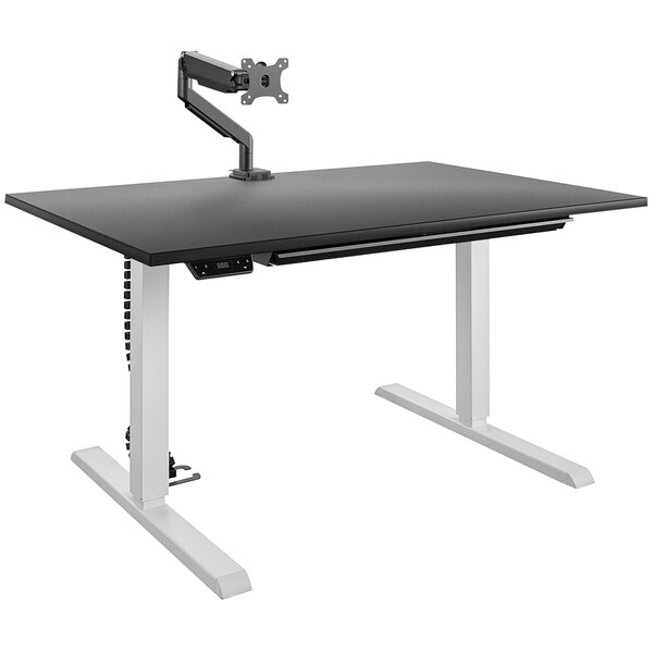 A black Bridgeport Pro-Desk with a white monitor on it.