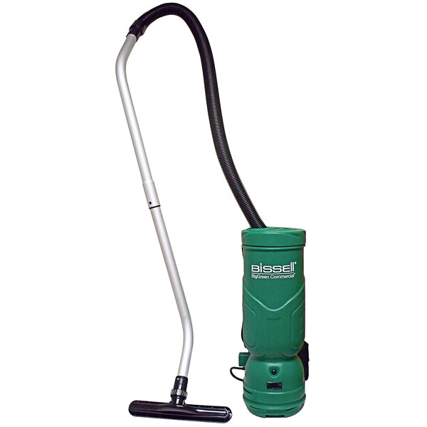 A green and black Bissell Commercial backpack vacuum cleaner with a green plastic container.