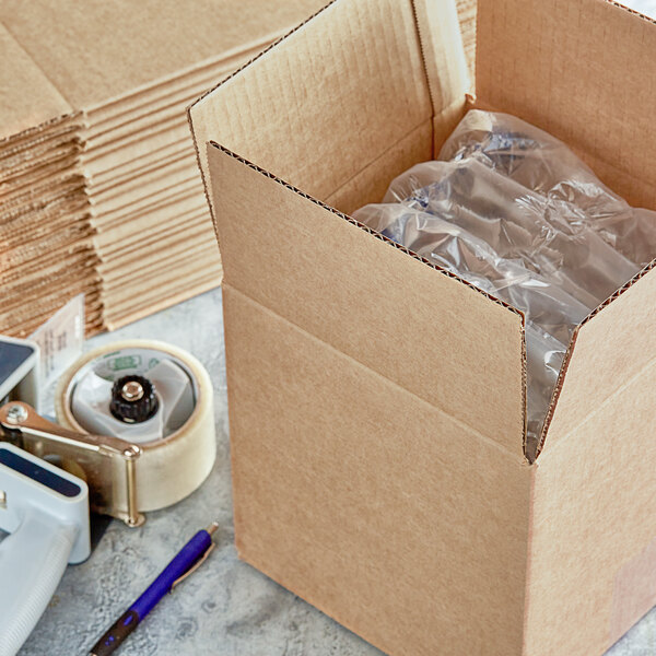 A Lavex corrugated shipping box with clear plastic inside.