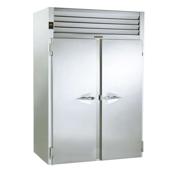 The open doors of a Traulsen two section correctional roll-in heated holding cabinet.