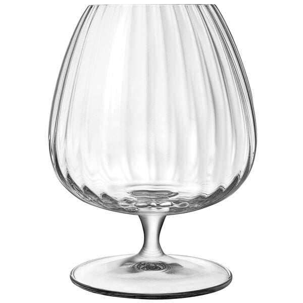 A Luigi Bormioli clear glass brandy snifter with a curved edge.