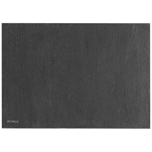 A rectangular black slate serving board.