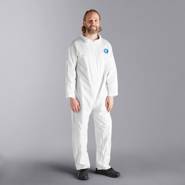 A man wearing a white Malt ProMax coverall with open wrists and ankles.