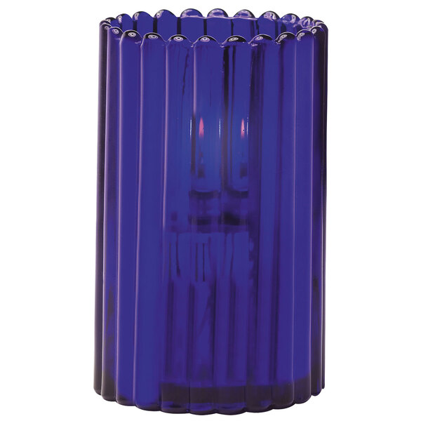 A blue glass Paragon liquid candle holder with a metal base.