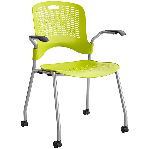 A Safco Sassy Grass green chair with metal legs.