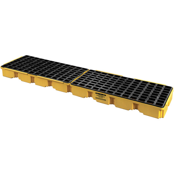 A yellow and black plastic pallet with platforms for 4 drums.