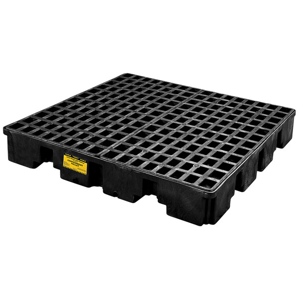 A white background with a black plastic Eagle Manufacturing drum pallet with holes.