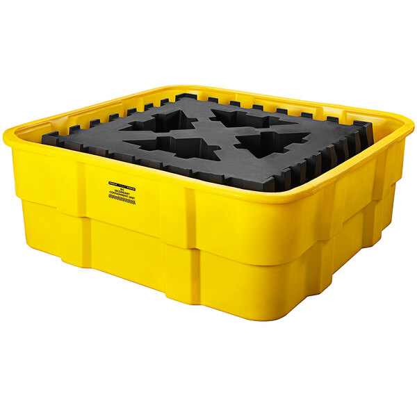A yellow plastic Eagle Manufacturing IBC spill containment unit with a black polyethylene platform.