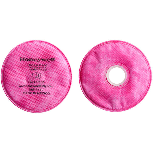 Two pink Honeywell P100 particulate filters.
