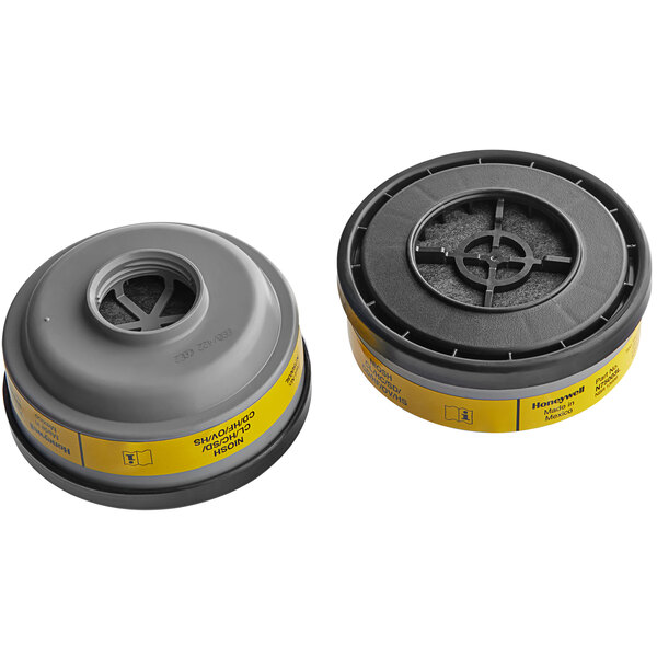 Two yellow and grey Honeywell N-Series organic vapor and acid gas filters with yellow labels.