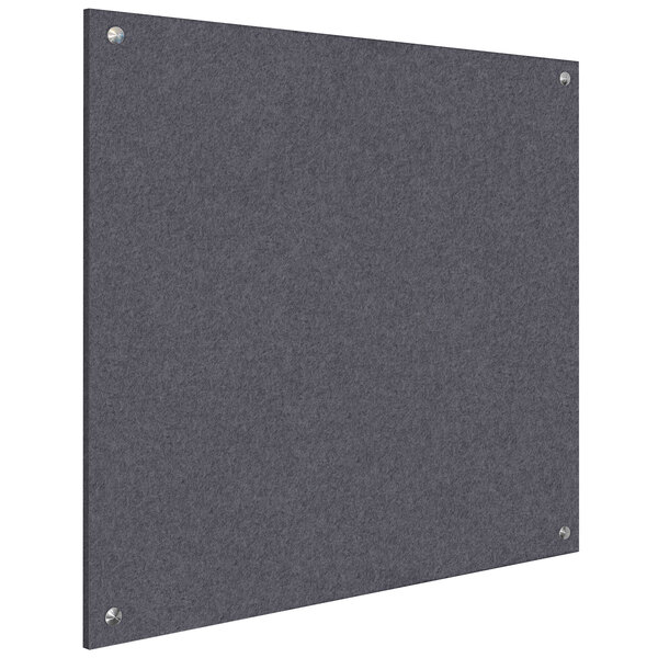 A dark grey square board with metal screws.