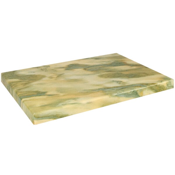 A close-up of a yellow and green marbled rectangular table top.