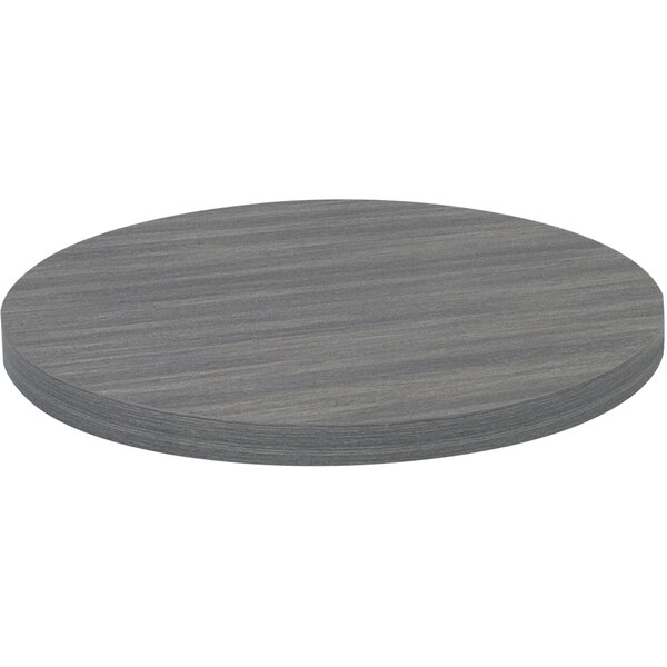 An American Tables & Seating light gray faux wood laminate round table top.