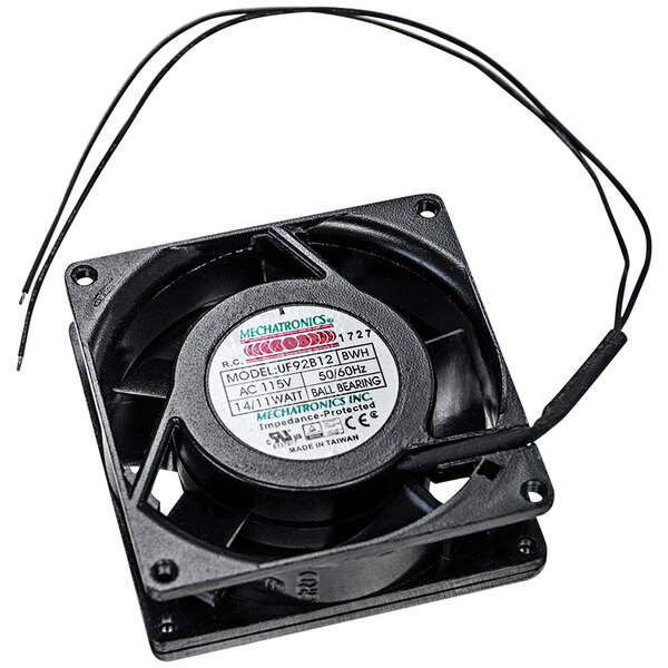A black Tortilla Masters fan with wires attached and a white label.
