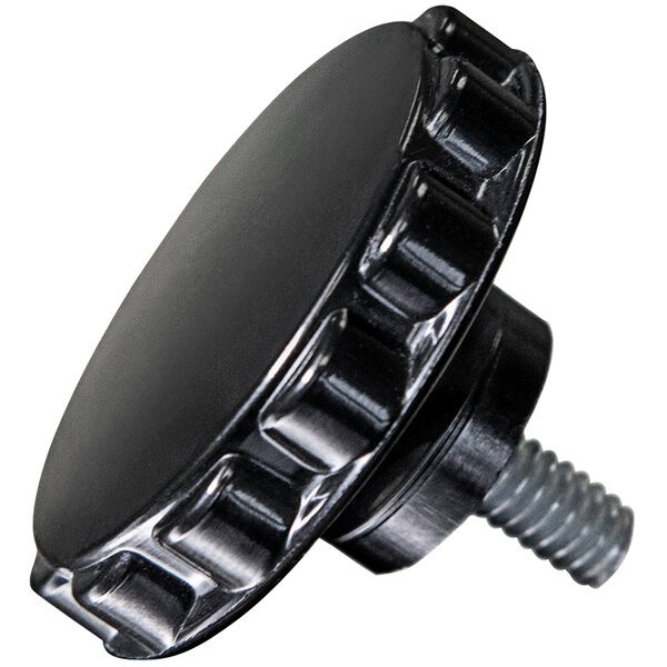 A black Tortilla Masters side cover knob with a screw.