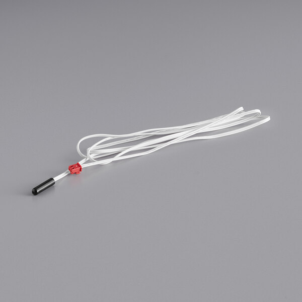 The Avantco temperature probe with a white cord and red and white plugs.