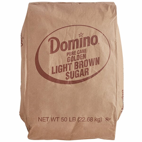A brown Domino Light Brown Sugar bag with red text.