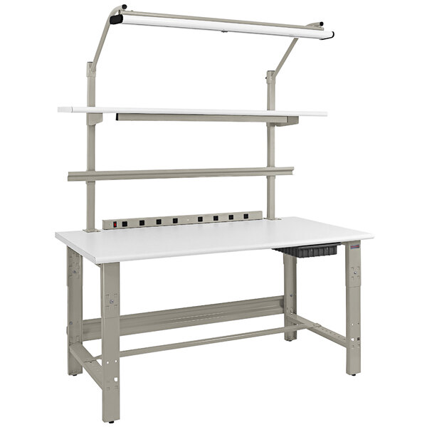 A white work bench with a grey frame and a white rectangular top with black edges.