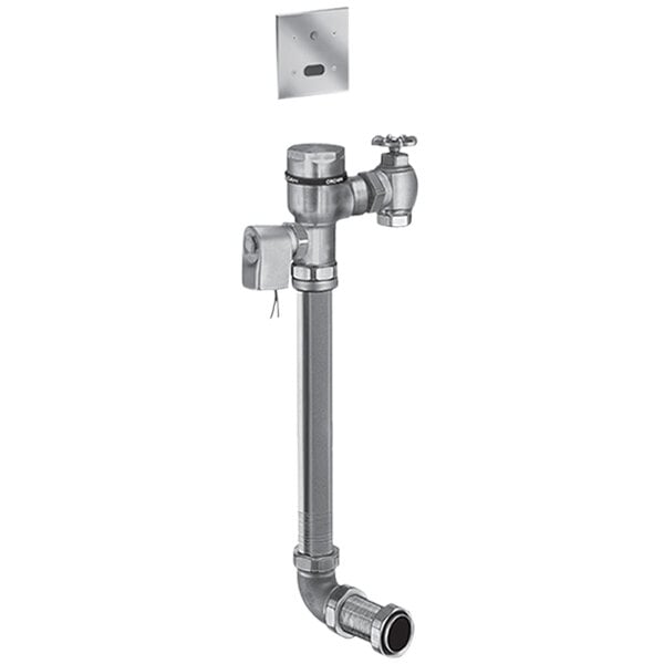 A metal Sloan rough brass water closet flushometer with a valve and electrical connection.
