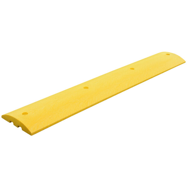 A yellow rectangular Plastics-R-Unique plastic object with channels.